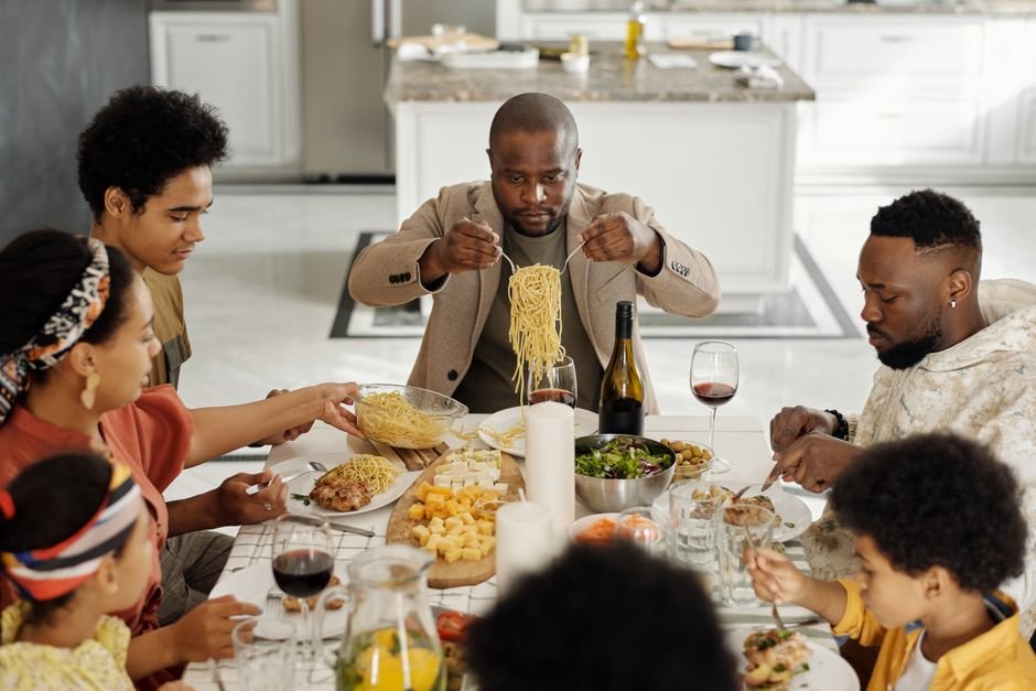 A family eating dinner together at home